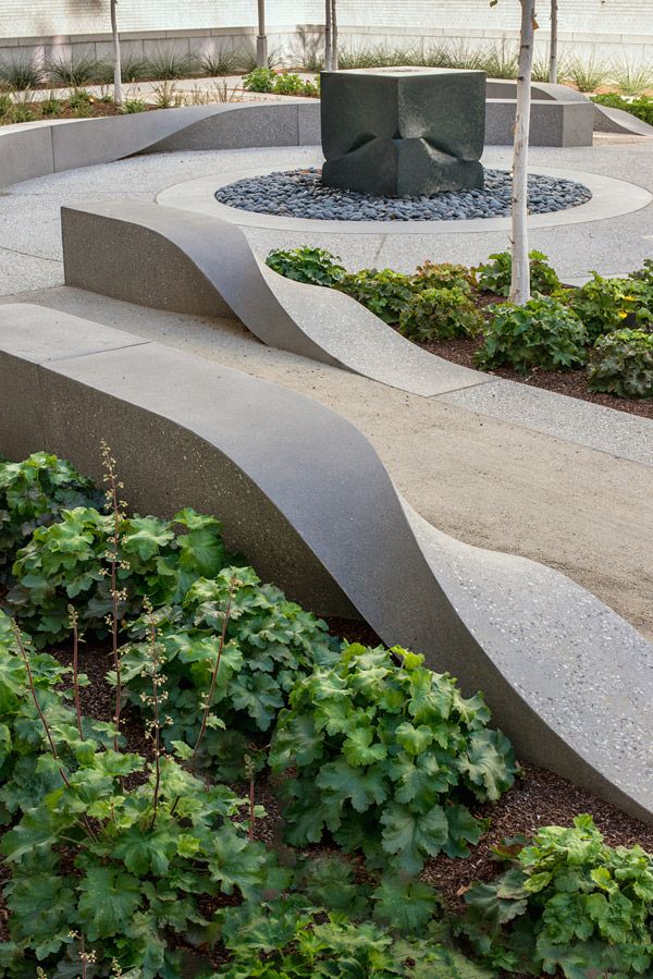 Decorative concrete landscaping with planters